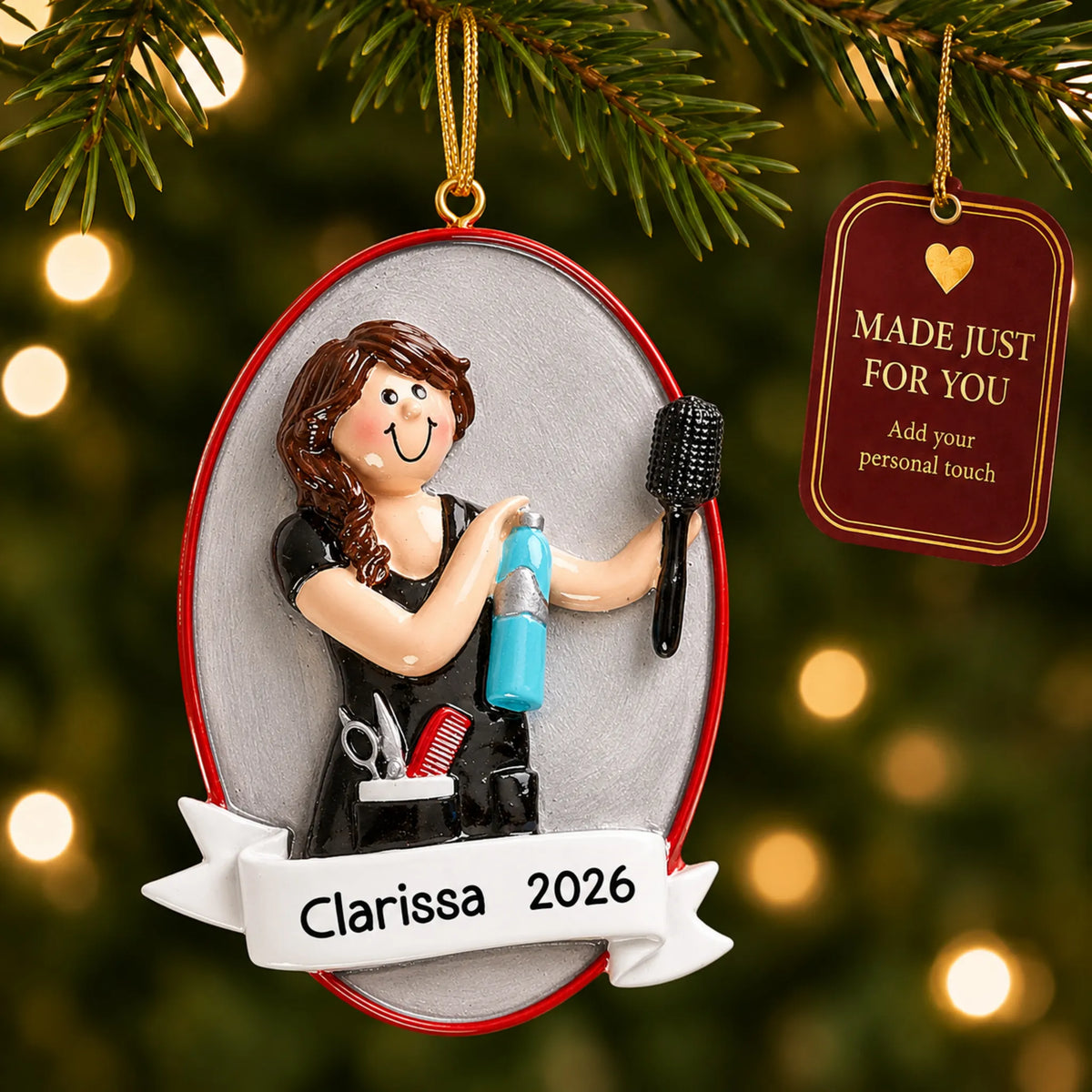 Cosmetologist christmas ornament hanging on a lit Christmas tree with a Made Just For You gift tag