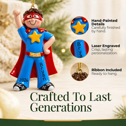 Hand-painted details and laser engraved personalization on the super hero boy christmas ornament, ribbon included