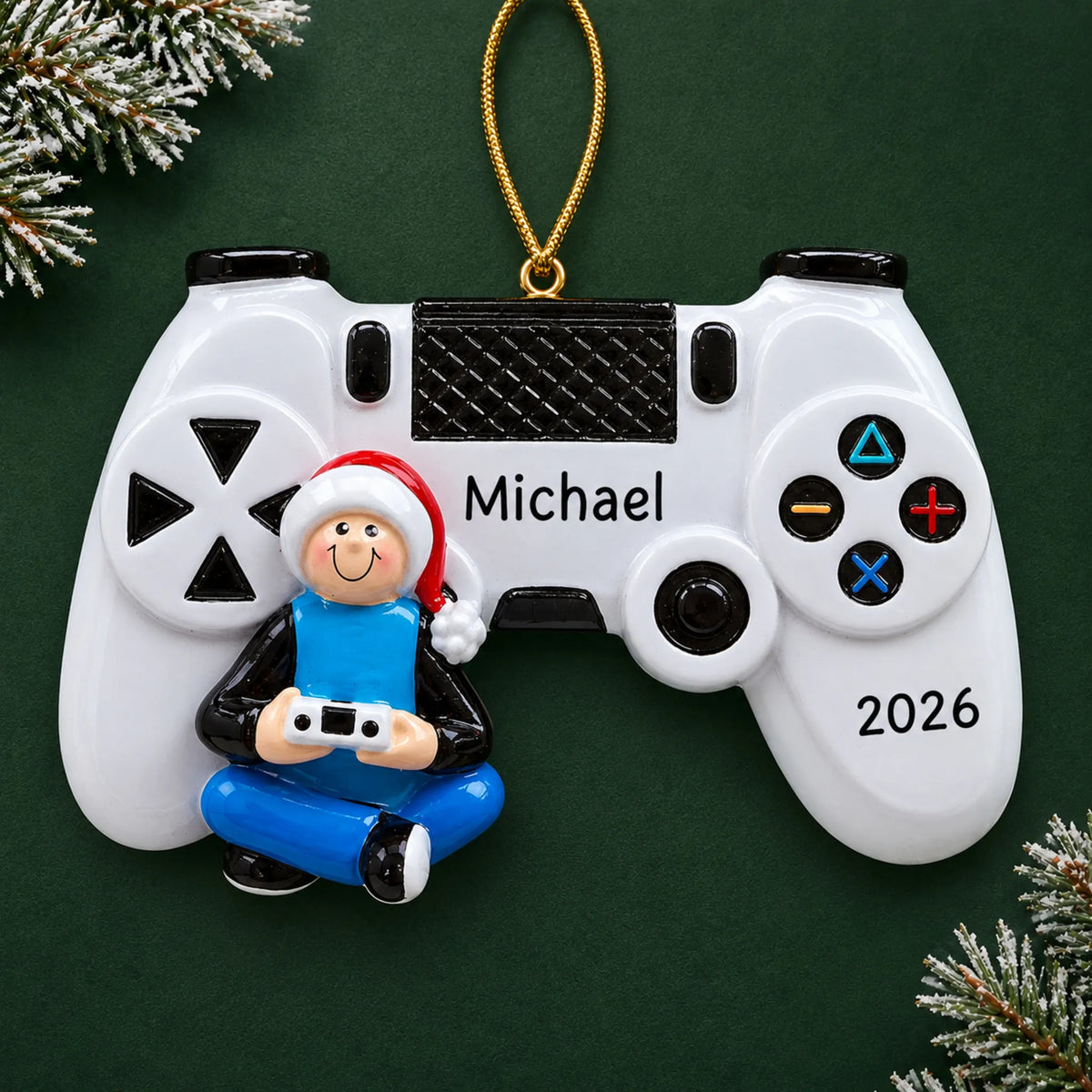Personalized video game controller christmas ornament on a dark green pine background