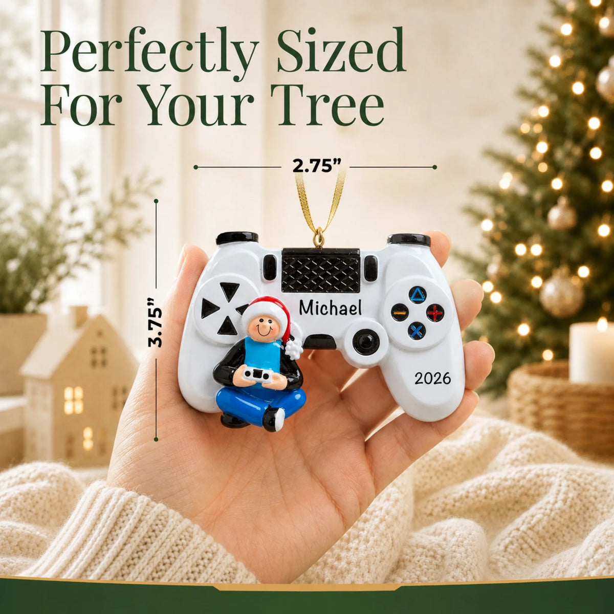 Size guide: the personalized video game controller christmas ornament is 2.75 in wide by 3.75 in tall, shown in hand