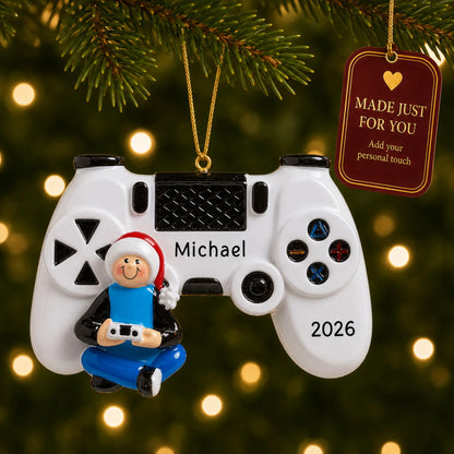 Video game controller christmas ornament hanging on a lit Christmas tree with a Made Just For You gift tag