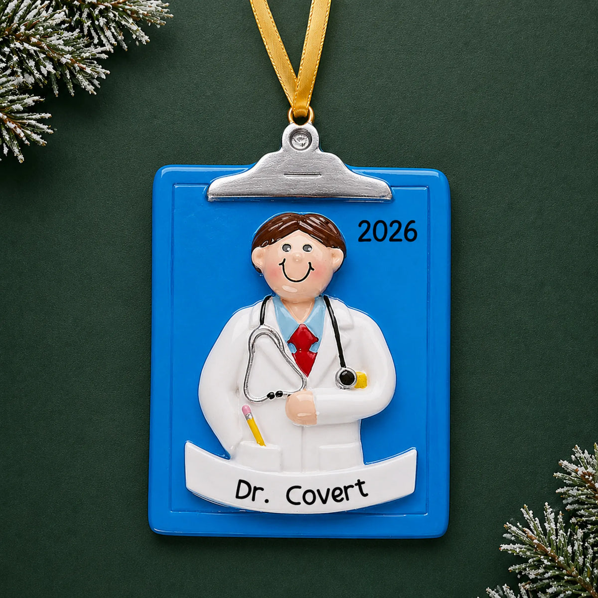 Personalized doctor guy clipboard christmas ornament on a dark green pine background