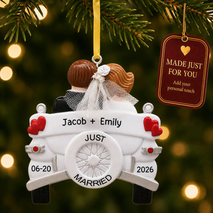 Personalized Just Married wedding car Christmas ornament on a lit Christmas tree with a Made Just For You tag