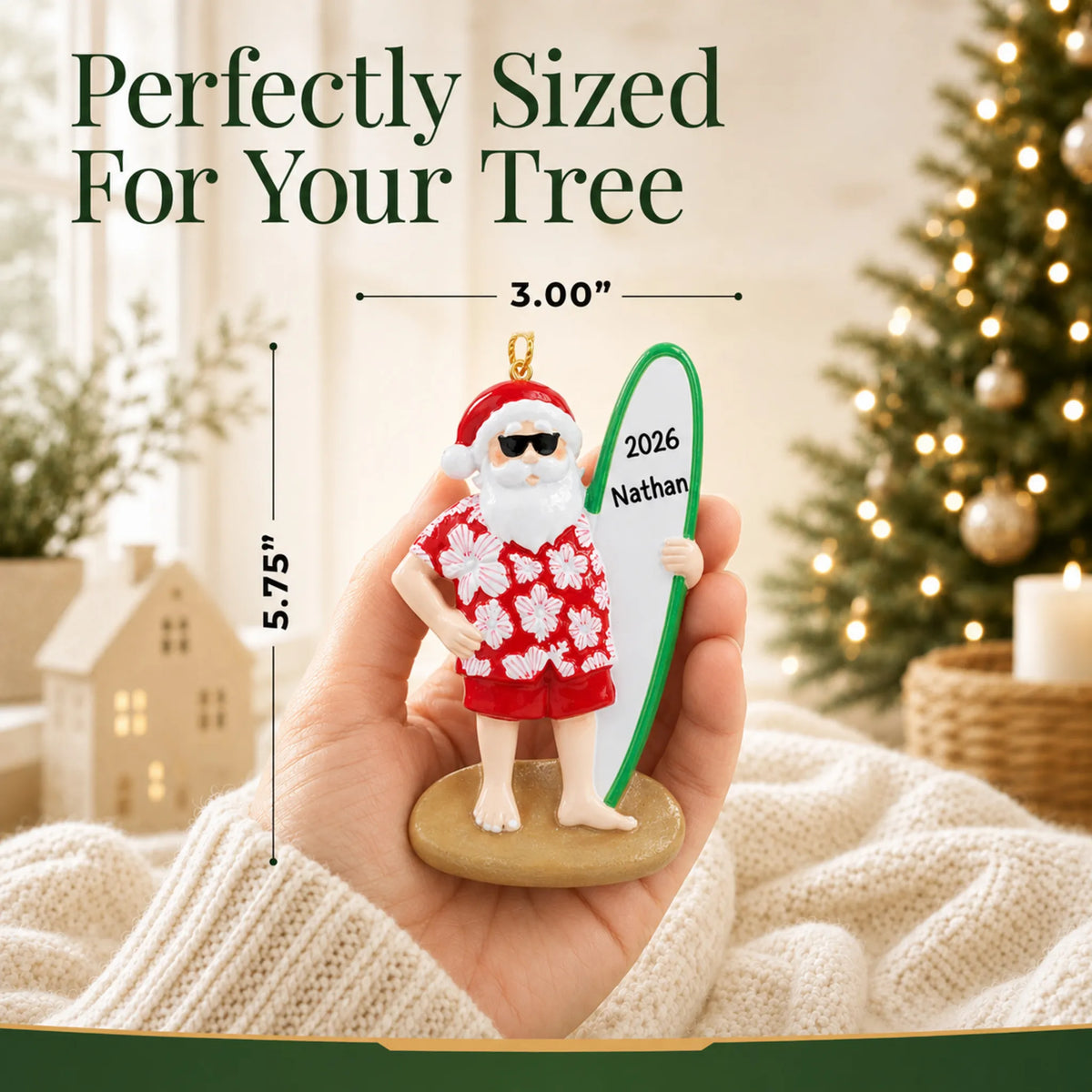 Size guide: the personalized Santa surfboard christmas ornament is 3.00 in wide by 5.75 in tall, shown in hand