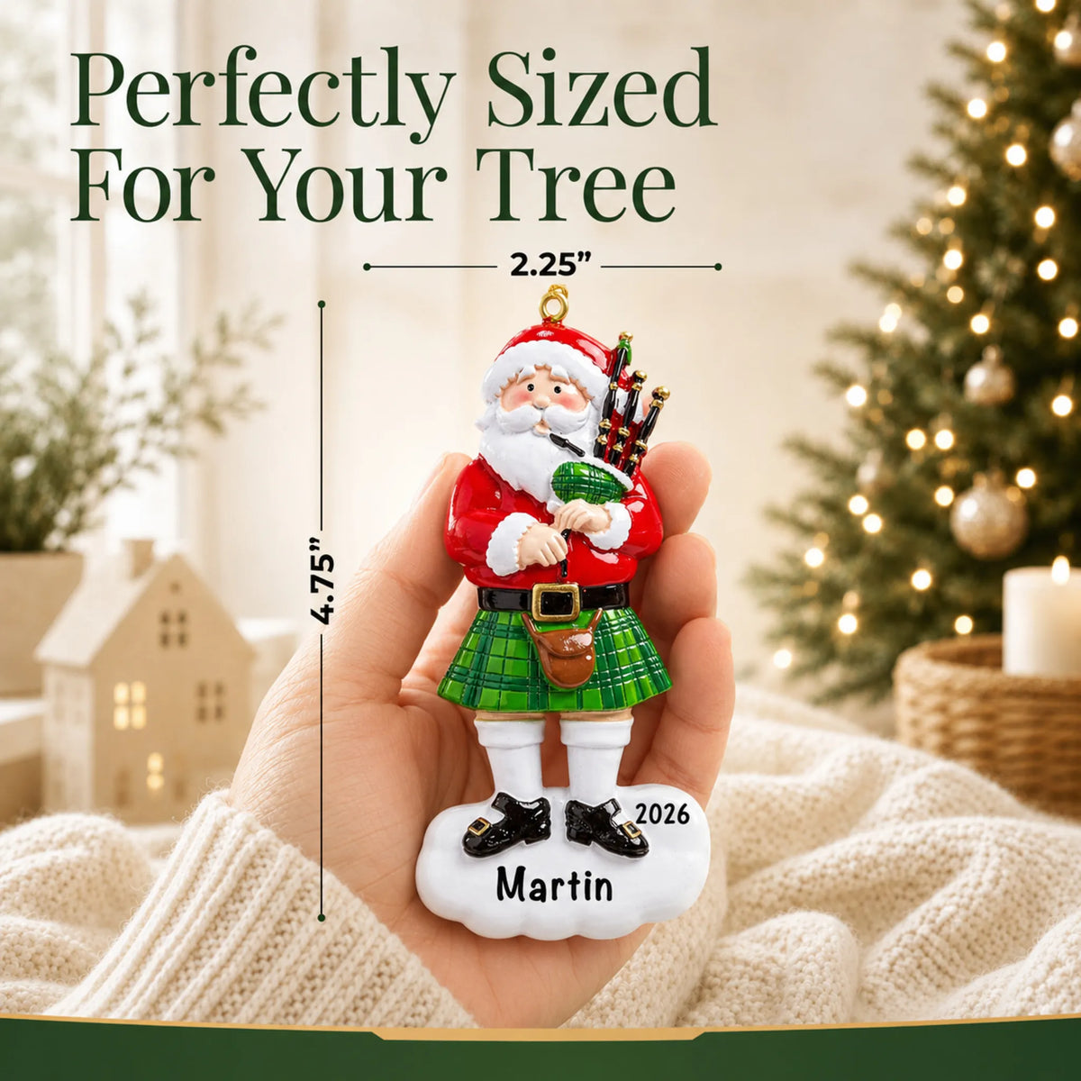Size guide: the personalized Scottish Bagpipes Santa christmas ornament is 2.25 in wide by 4.75 in tall, shown in hand