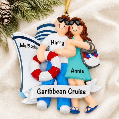 Personalized cruise ship love couple christmas ornament laid on a soft white knit blanket