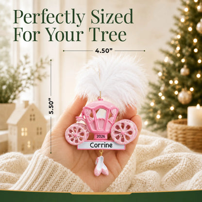 Size guide: the personalized princess carriage christmas ornament is 4.50 in wide by 5.50 in tall, shown in hand