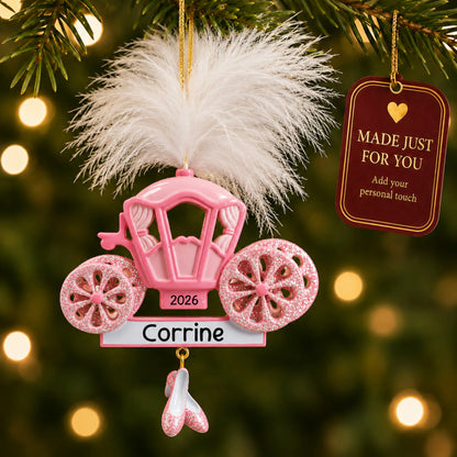 Princess carriage christmas ornament hanging on a lit Christmas tree with a Made Just For You gift tag