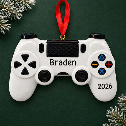 Personalized gaming controller christmas ornament on a dark green pine background