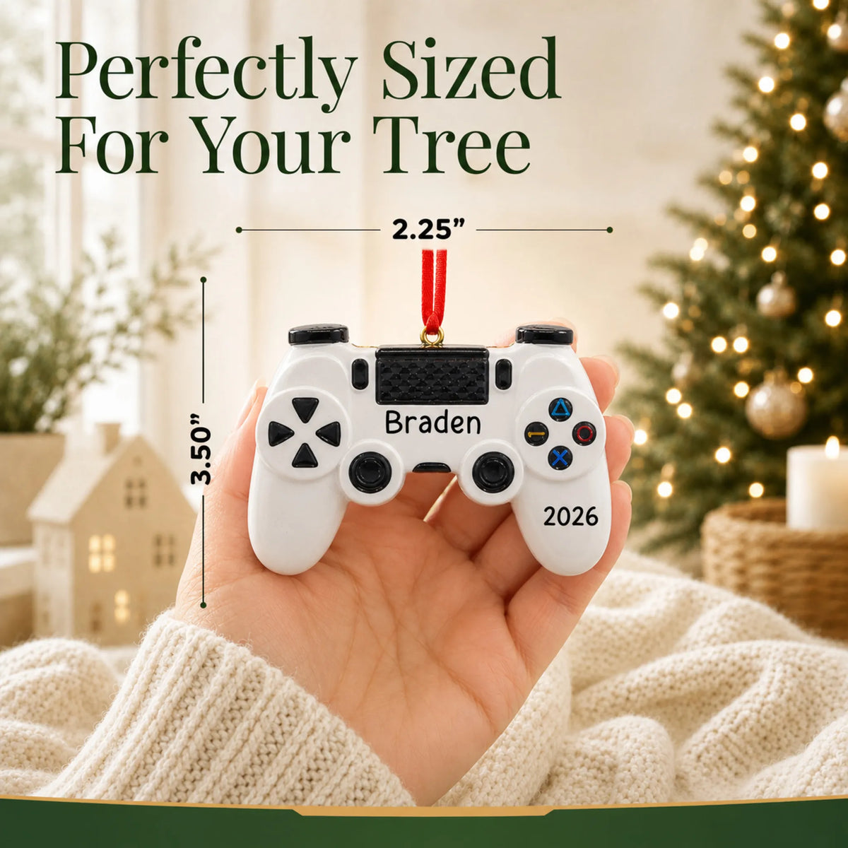 Size guide: the personalized gaming controller christmas ornament is 2.25 in wide by 3.50 in tall, shown in hand