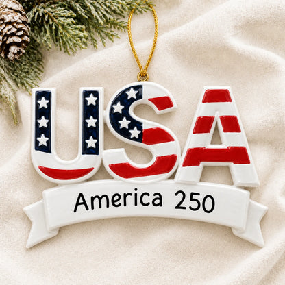 Personalized America 250 USA Christmas ornament shown on a soft white blanket