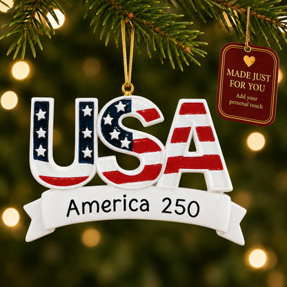 Personalized America 250 USA Christmas ornament hanging among tree lights with a Made Just For You tag