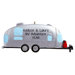 Personalized Airstream camper Christmas ornament, a silver bullet travel trailer, engraved with a name and year