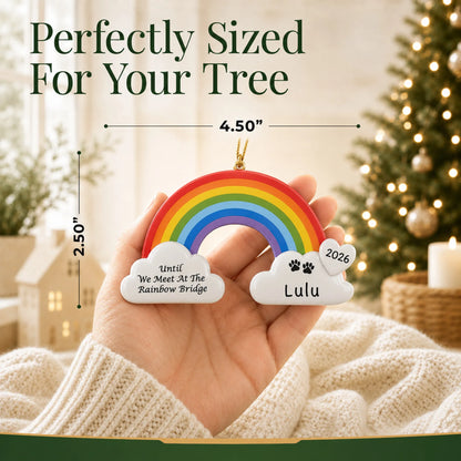 Size guide: the personalized Pet Rainbow Bridge Memorial christmas ornament is 4.50 in wide by 2.50 in tall, shown in hand