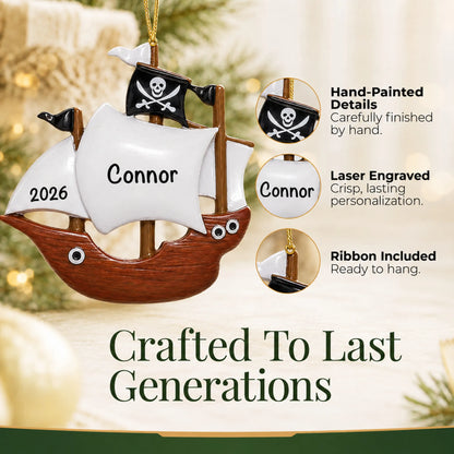 Hand-painted details and laser engraved personalization on the pirate ship kids christmas ornament, ribbon included