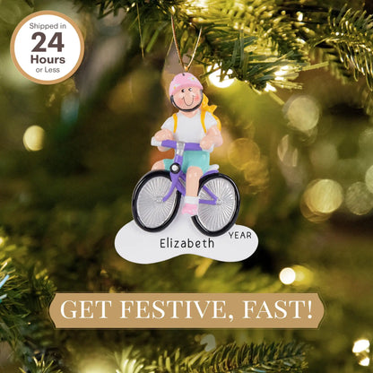 Adorno navideño de niña en bicicleta - Rubia 