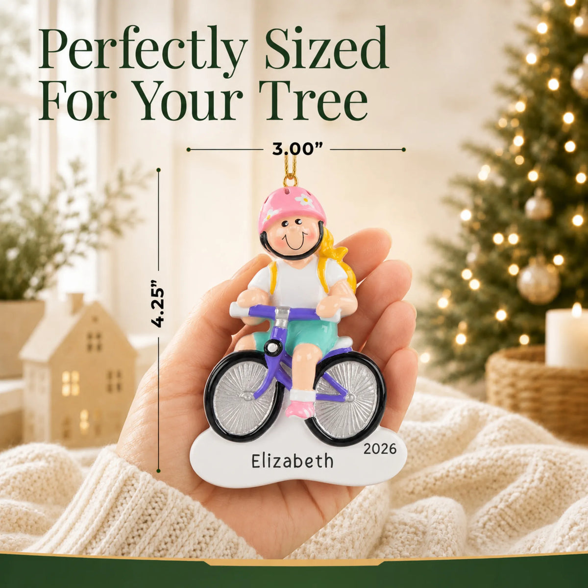 Size guide: the personalized blonde girl bike christmas ornament is 3.00 in wide by 4.25 in tall, shown in hand