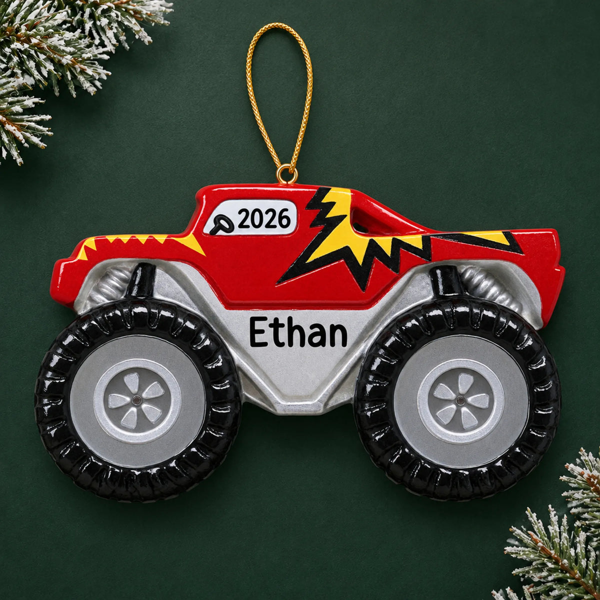 Personalized monster truck big wheels christmas ornament on a dark green pine background