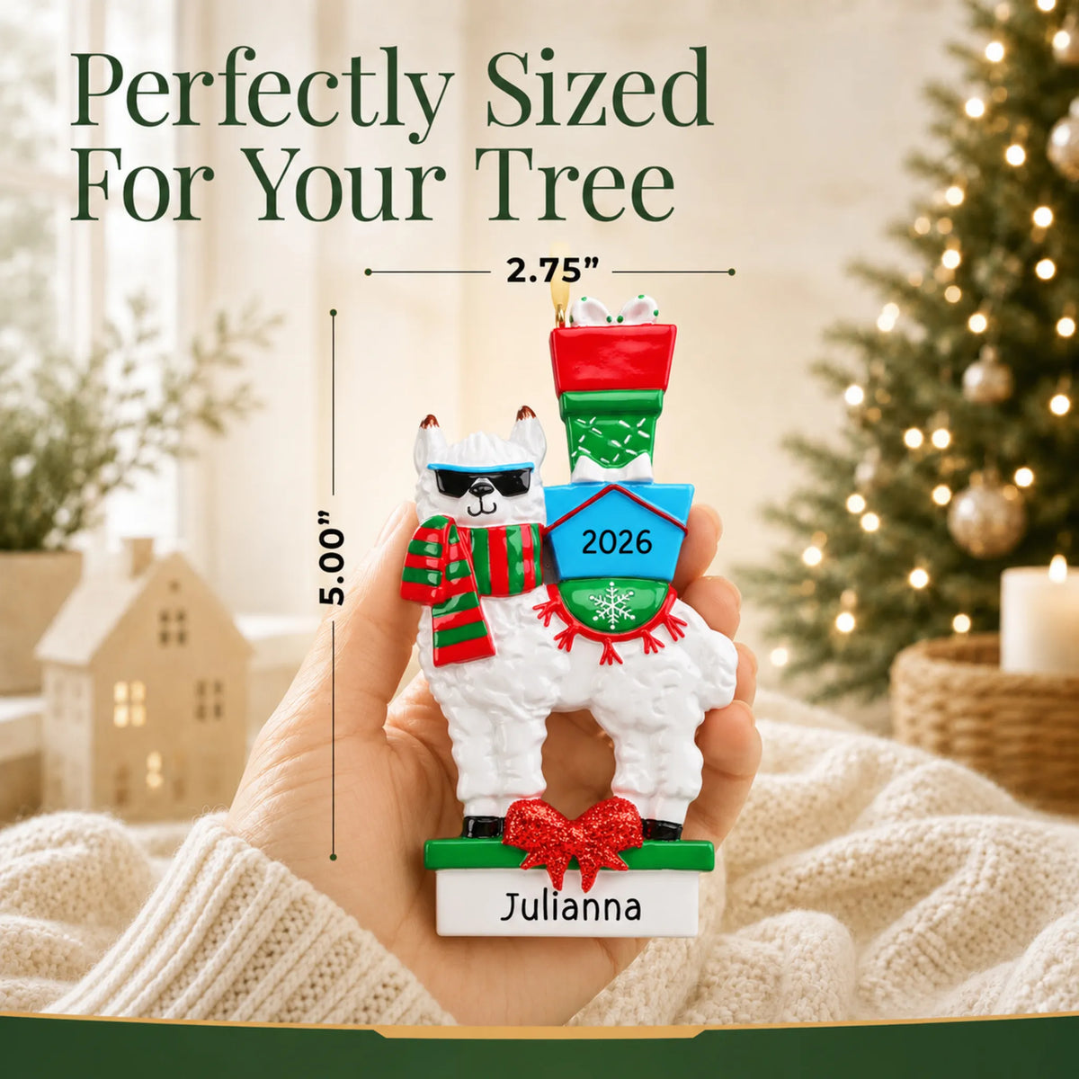 Size guide: the personalized llama christmas ornament is 2.75 in wide by 5.00 in tall, shown in hand