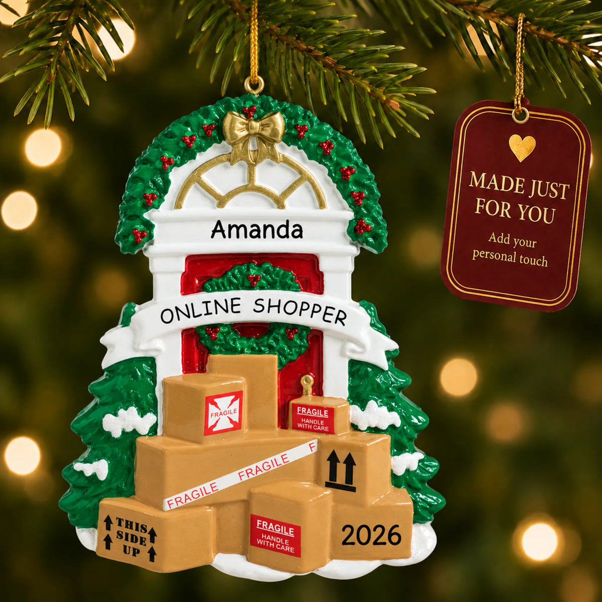 Online shopper christmas ornament hanging on a lit Christmas tree with a Made Just For You gift tag