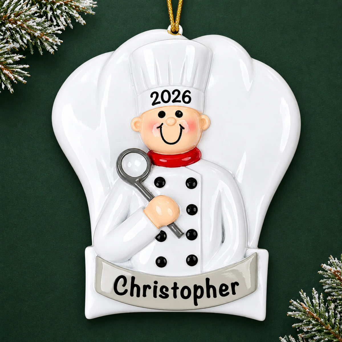 Personalized chef cooking christmas ornament on a dark green pine background