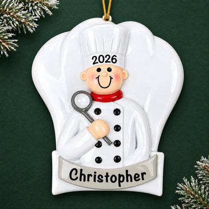 Personalized chef cooking christmas ornament on a dark green pine background