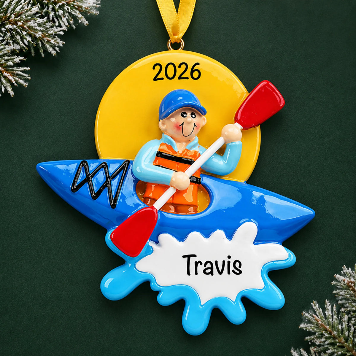 Personalized kayak guy christmas ornament on a dark green pine background