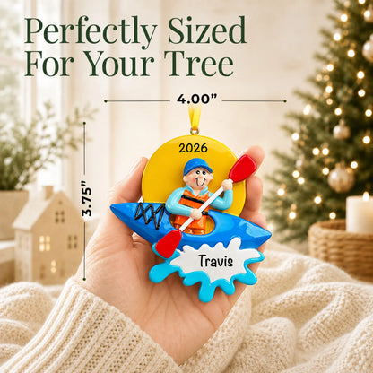 Size guide: the personalized kayak guy christmas ornament is 4.00 in wide by 3.75 in tall, shown in hand