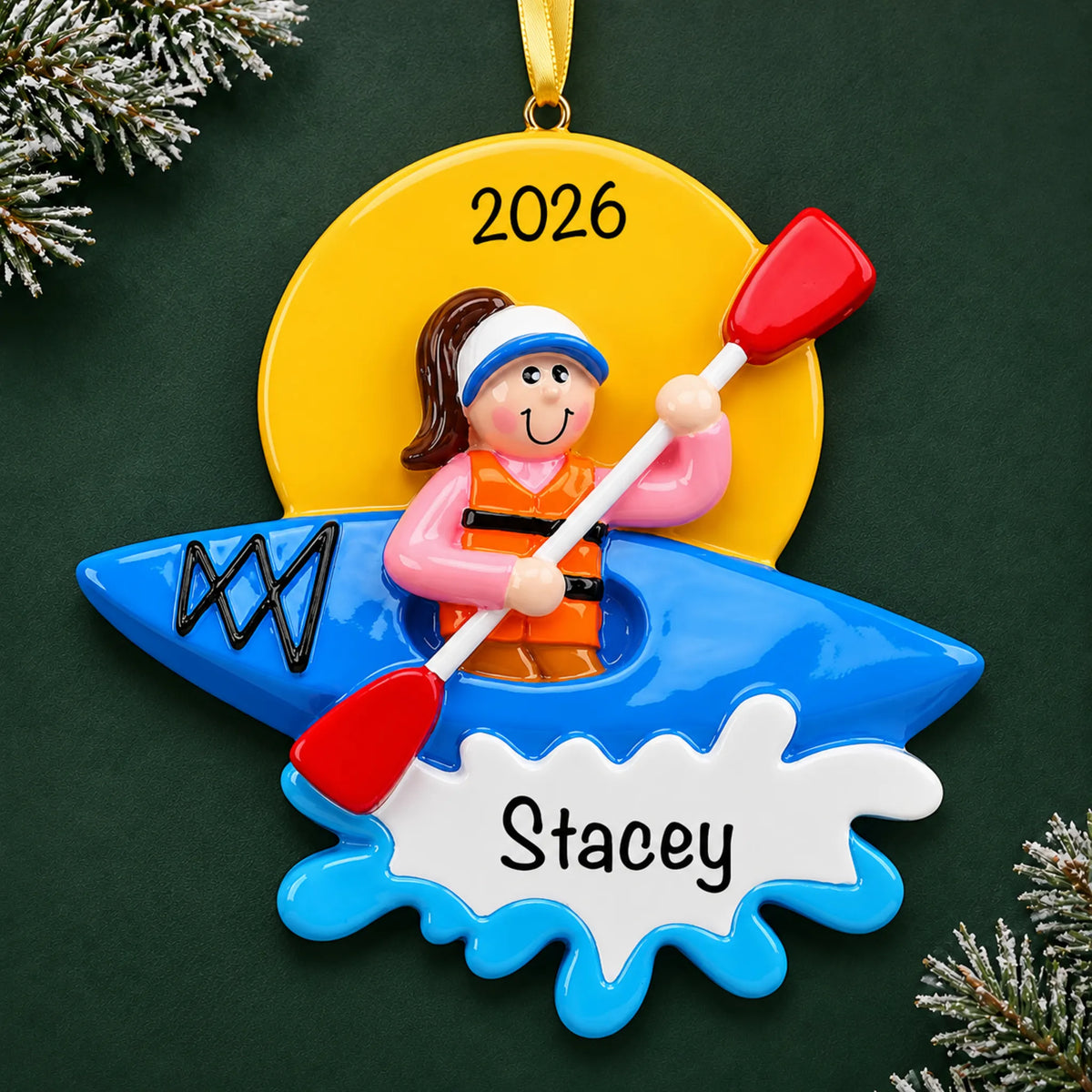 Personalized kayak girl christmas ornament on a dark green pine background