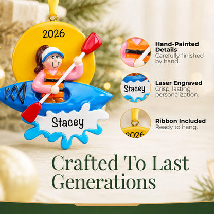 Hand-painted details and laser engraved personalization on the kayak girl christmas ornament, ribbon included