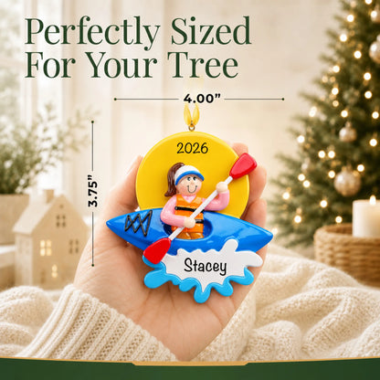 Size guide: the personalized kayak girl christmas ornament is 4.00 in wide by 3.75 in tall, shown in hand