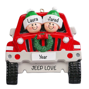 Personalized red off-road SUV couple ornament with names on hats and a wreath on the grille