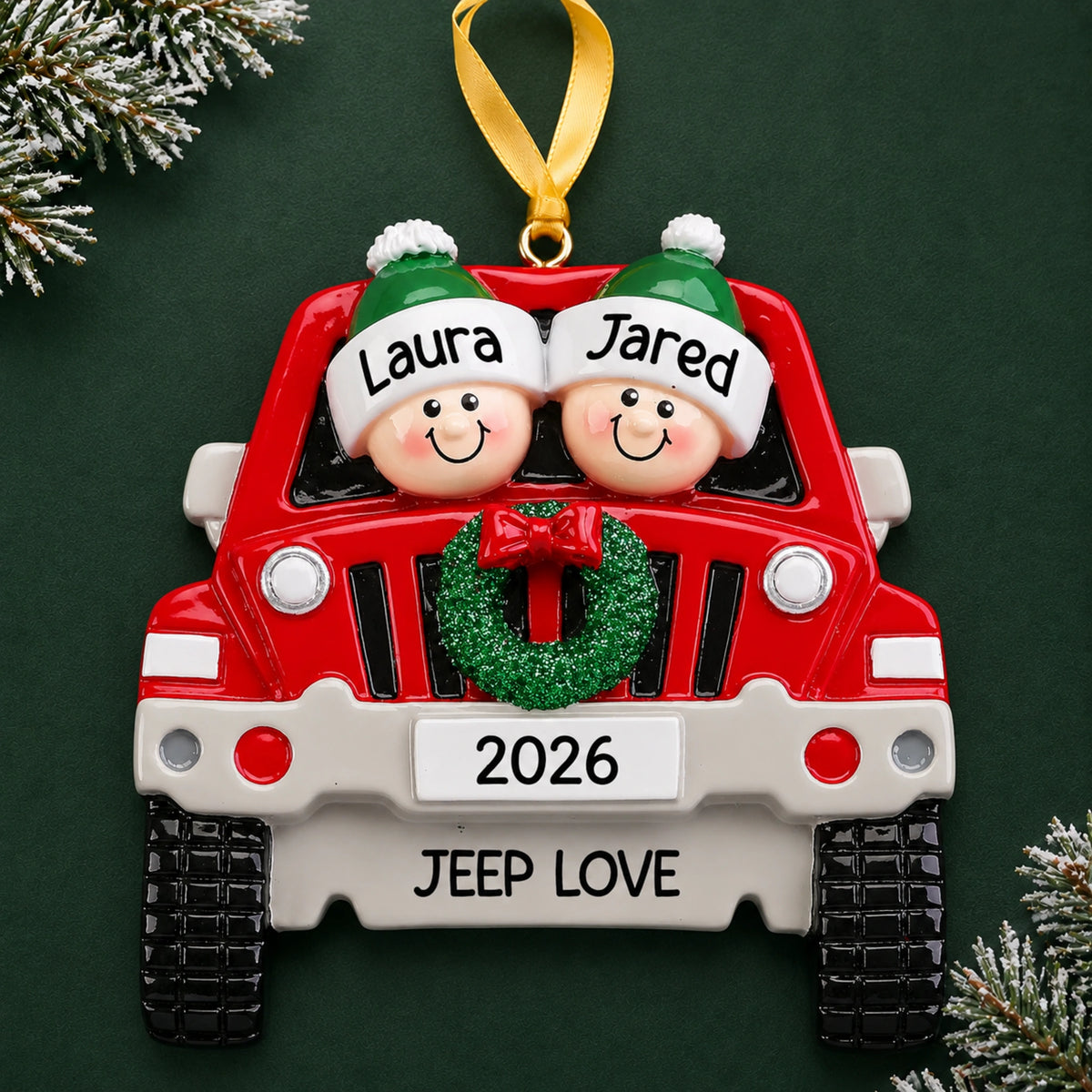 Personalized SUV couple christmas ornament with two named figures and a wreath on a red off-road SUV