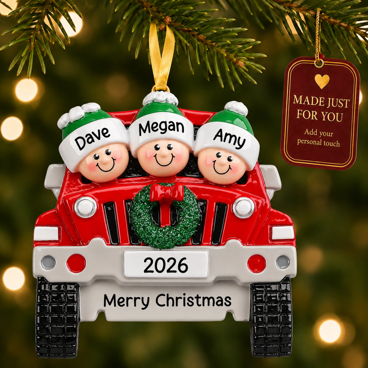 Personalized SUV family of 3 ornament hanging on a tree with Made Just For You tag