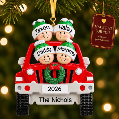 Personalized SUV family of 4 ornament hanging on a tree with Made Just For You tag