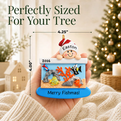 Size guide: the personalized Fish Aquarium christmas ornament is 4.25 in wide by 4.00 in tall, shown in hand