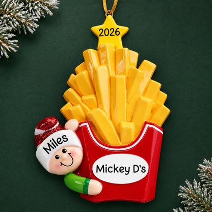 Personalized French Fries christmas ornament on a dark green pine background