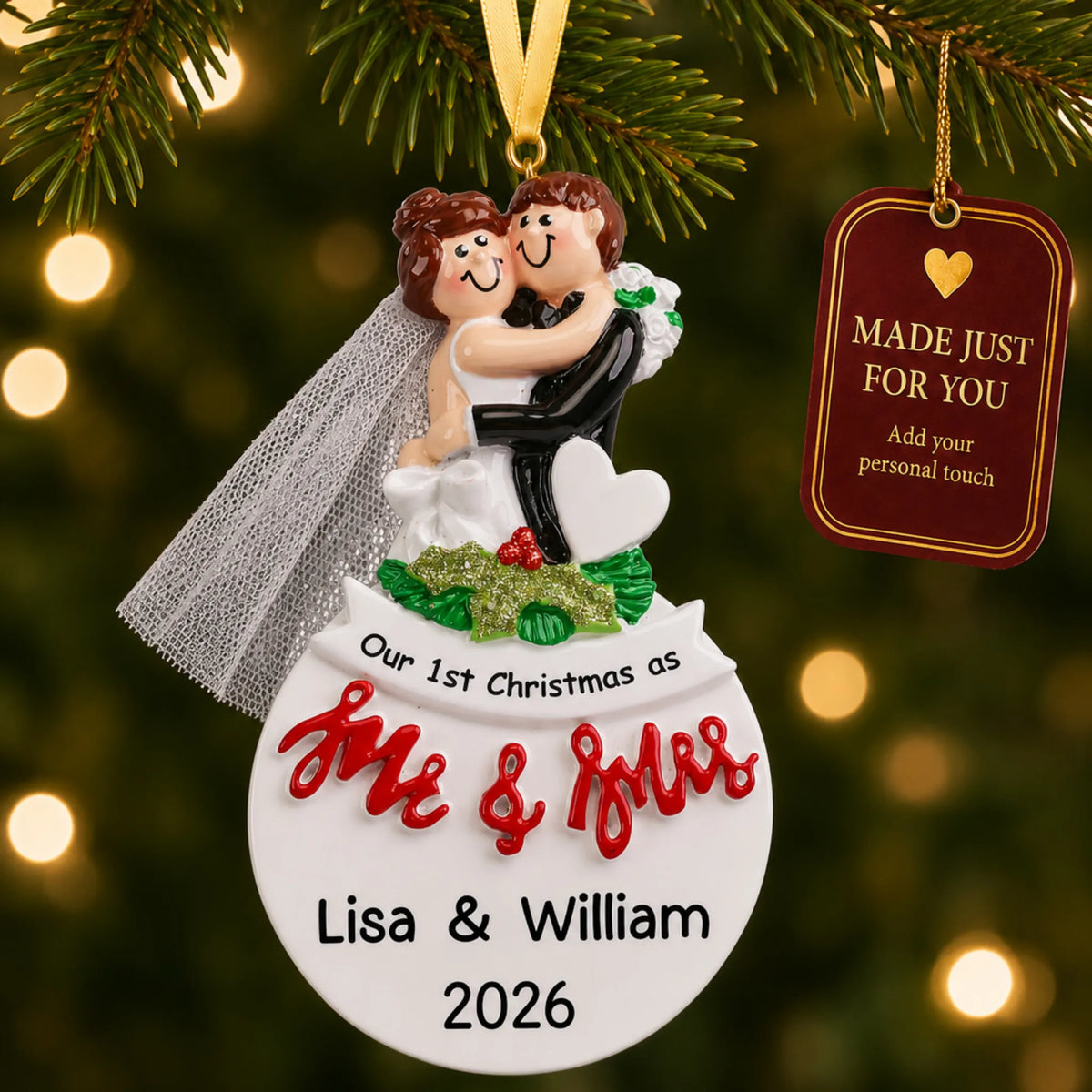 Personalized Mr. & Mrs. bride and groom Christmas ornament on a lit Christmas tree with a Made Just For You tag