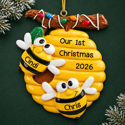 Personalized honey bees couple christmas ornament on a dark green pine background