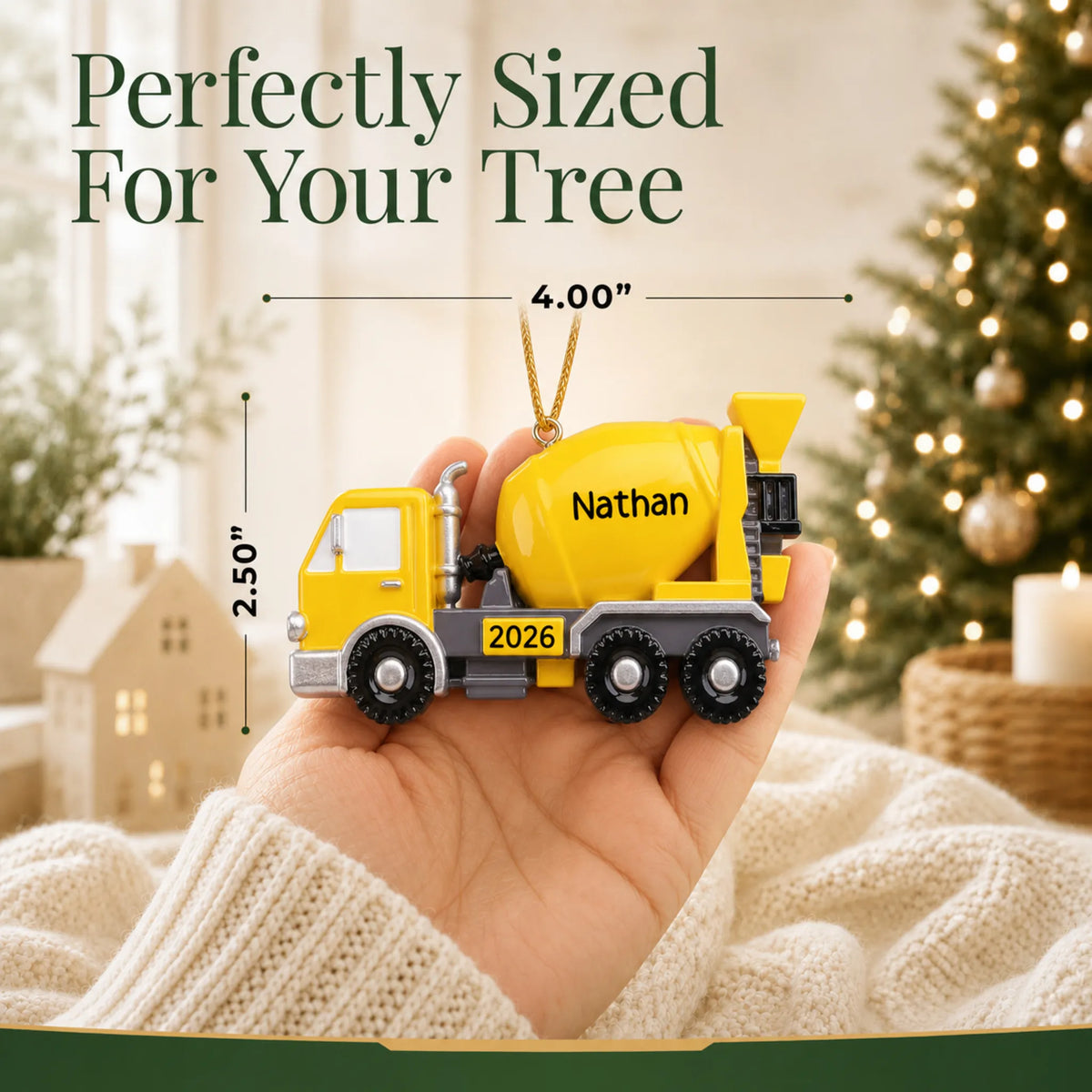 Size guide: the personalized cement truck christmas ornament is 4.00 in wide by 2.50 in tall, shown in hand