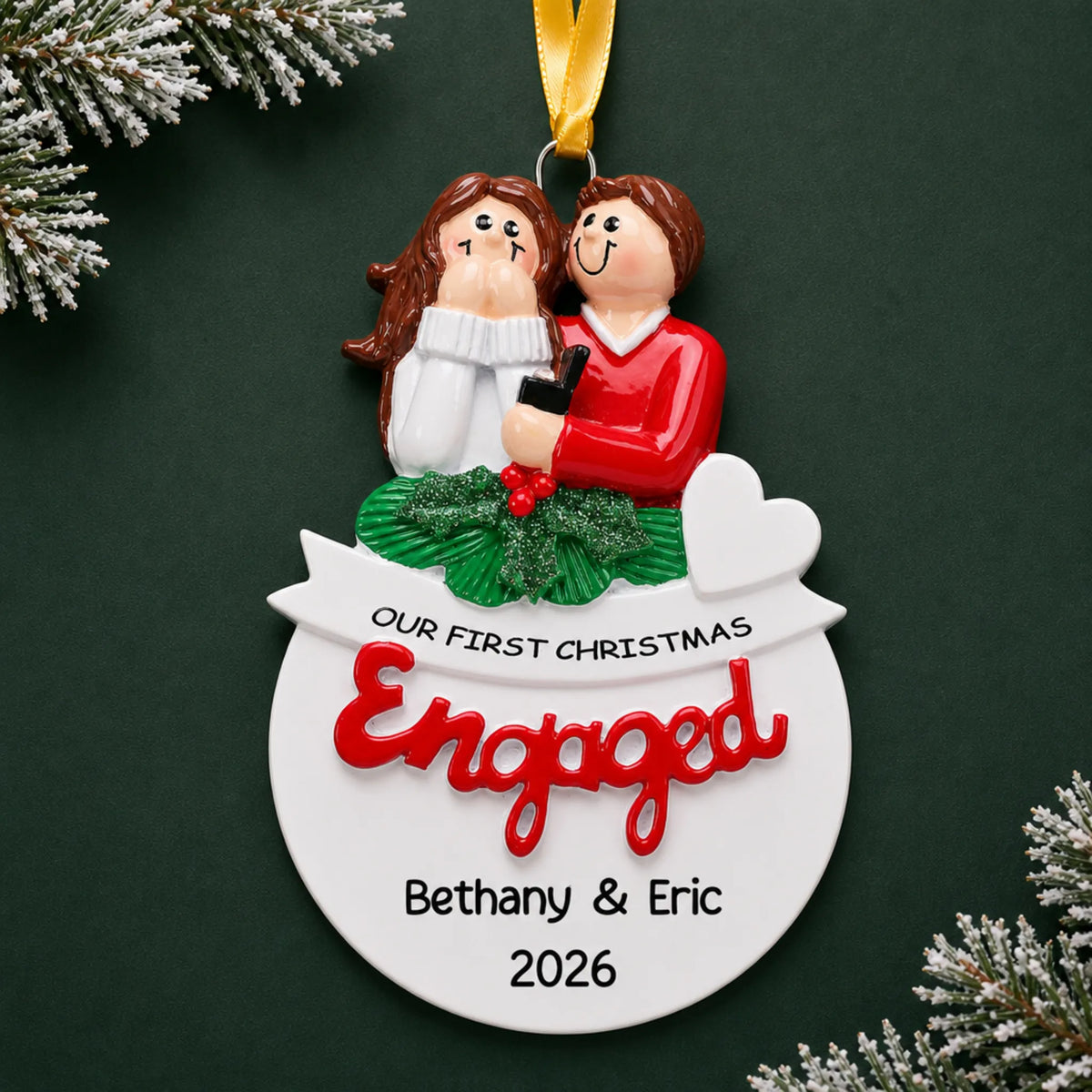 Personalized Our First Christmas Engaged Christmas ornament with a couple on holly above a globe with names and year