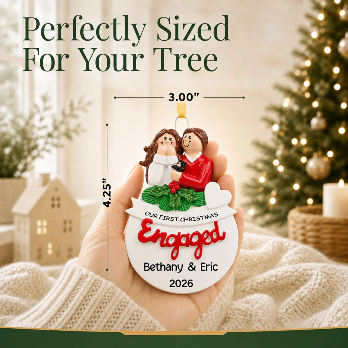 Personalized Our First Christmas Engaged Christmas ornament held in a hand to show its 3 by 4.25 inch size