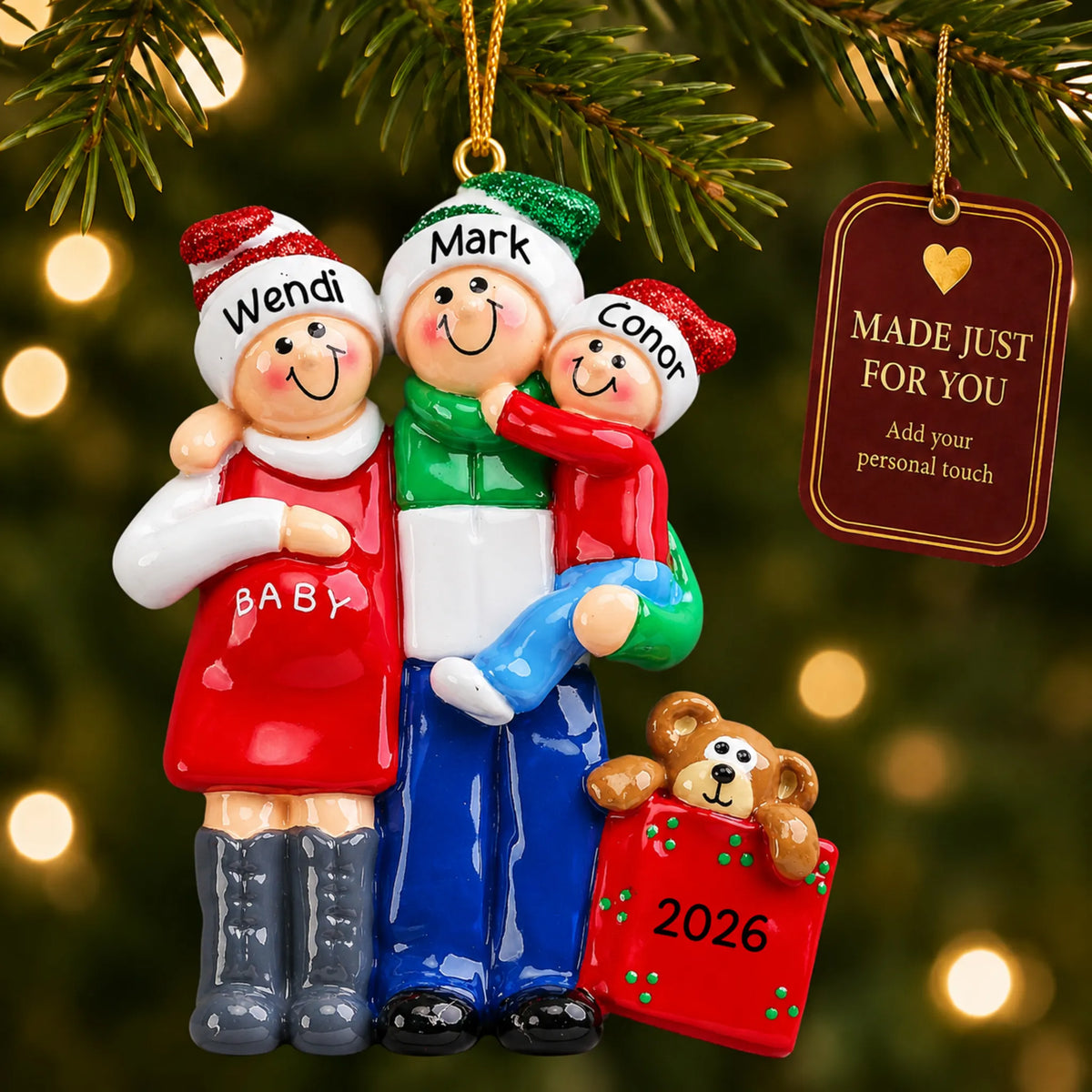 Our Second Miracle Expecting christmas ornament hanging on a lit Christmas tree with a Made Just For You gift tag