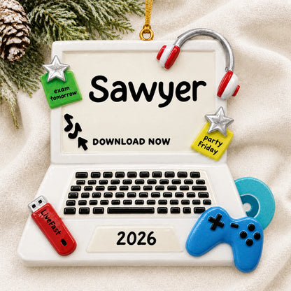 Personalized video games christmas ornament laid on a soft white knit blanket