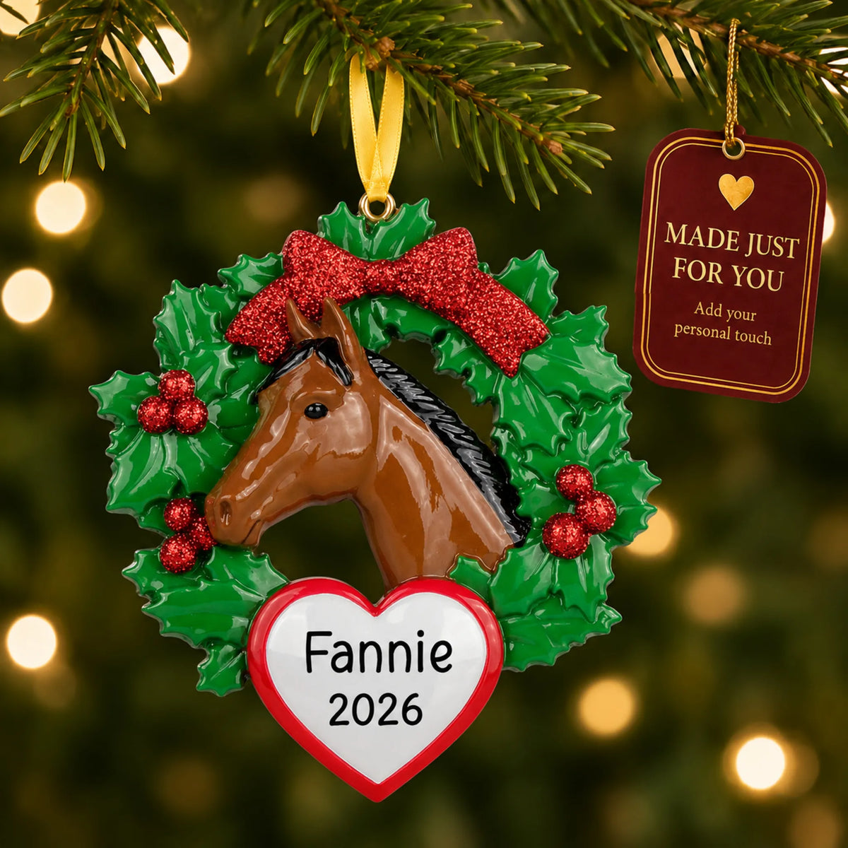 Horse wreath christmas ornament hanging on a lit Christmas tree with a Made Just For You gift tag