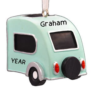 Personalized teardrop camper Christmas ornament, a retro travel trailer, hand-lettered with a name and year