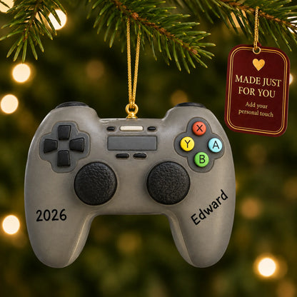 3d video game controller christmas ornament hanging on a lit Christmas tree with a Made Just For You gift tag