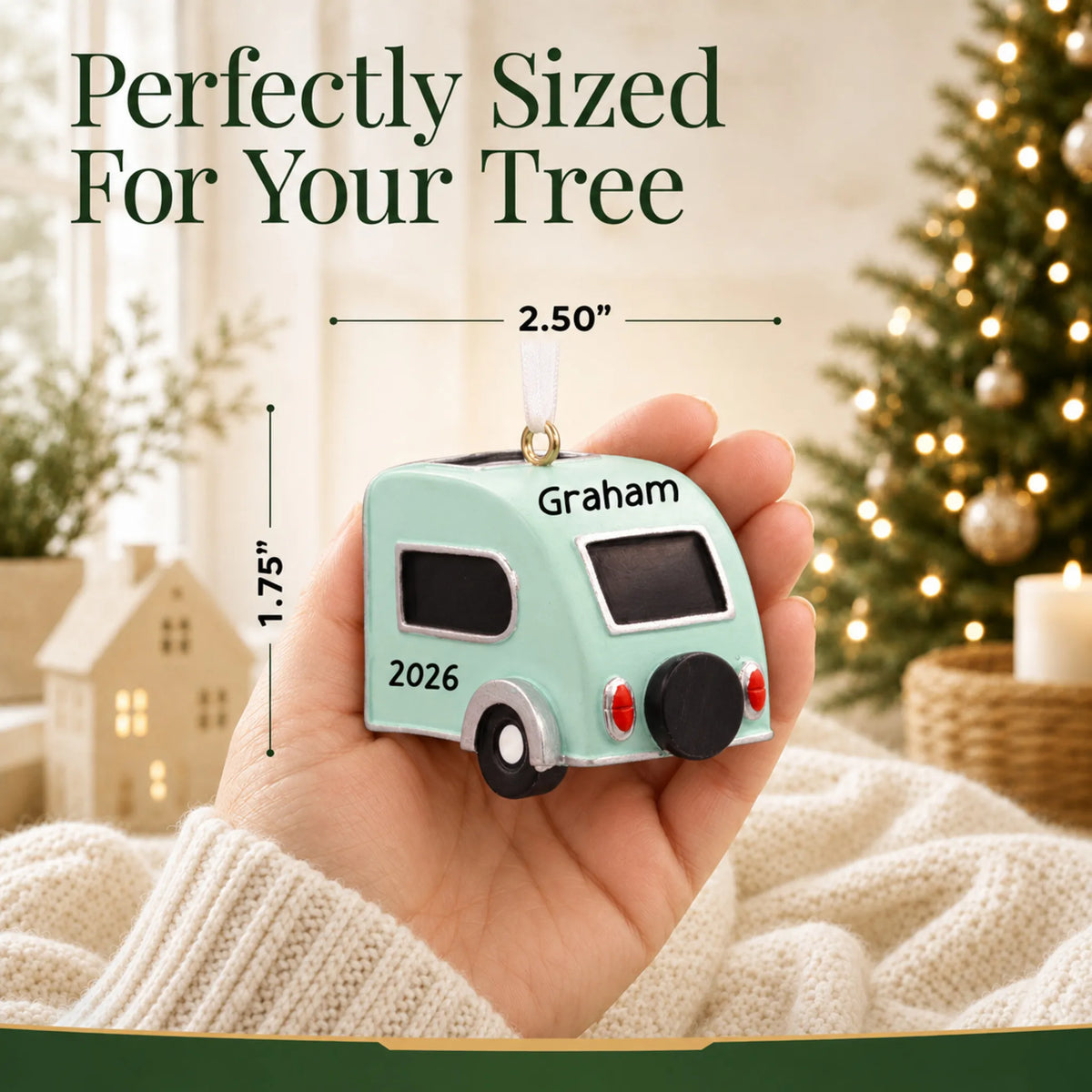 Size guide: the personalized teardrop camper trailer christmas ornament is 2.50 in wide by 1.75 in tall, shown in hand