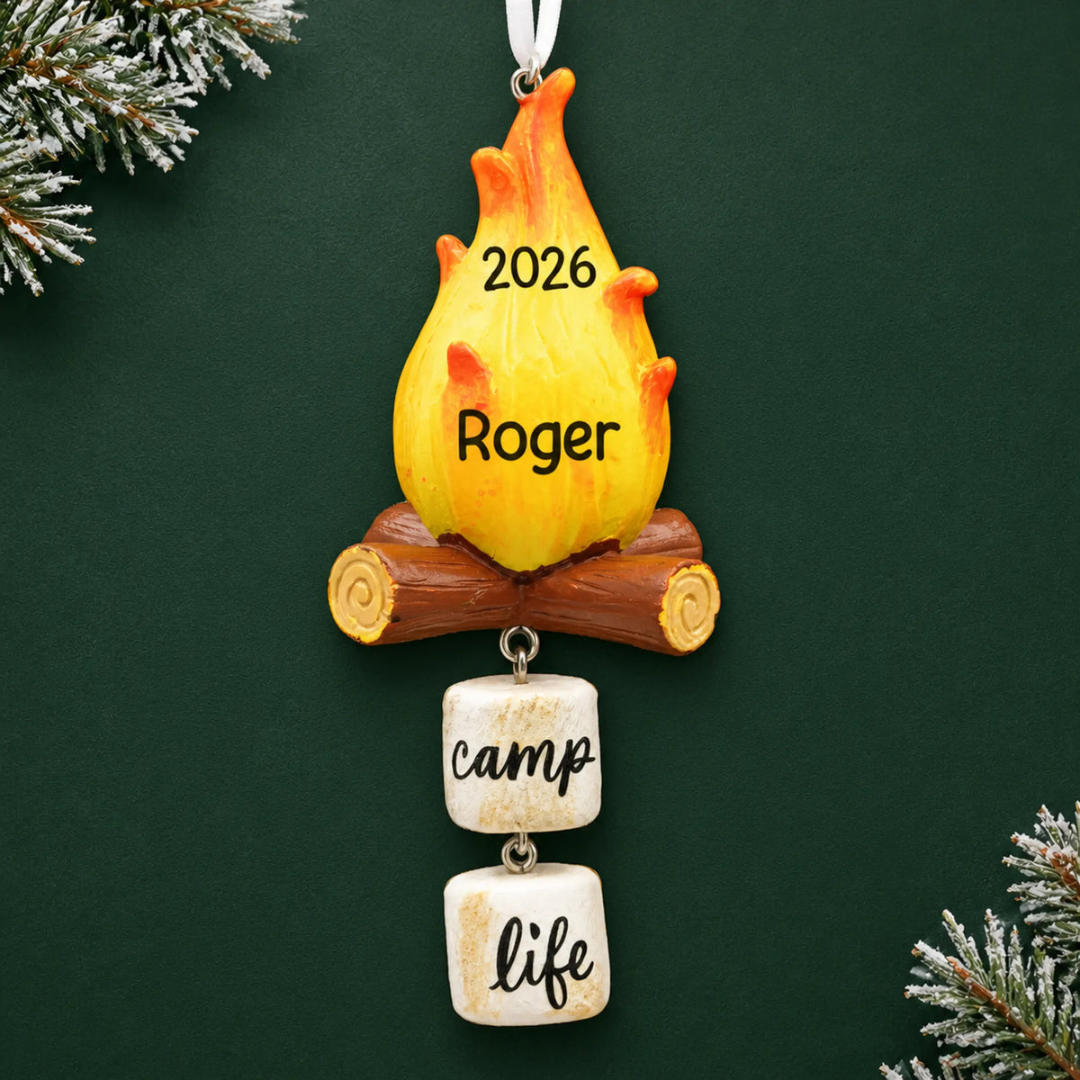 Personalized campfire christmas ornament on a dark green pine background