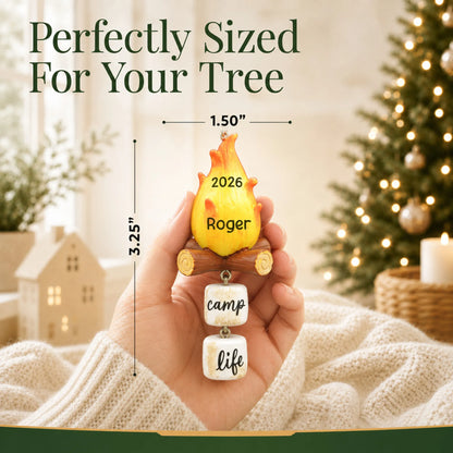 Size guide: the personalized campfire christmas ornament is 1.50 in wide by 3.25 in tall, shown in hand